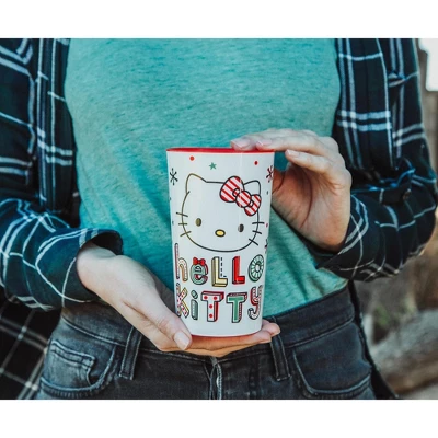 Silver Buffalo Sanrio Hello Kitty Holiday 4-Piece Plastic Cup Set | Each Holds 22 Ounces 2 Silver Buffalo Sanrio Hello Kitty Holiday 4-Piece Plastic Cup Set | Each Holds 22 Ounces - Image 2