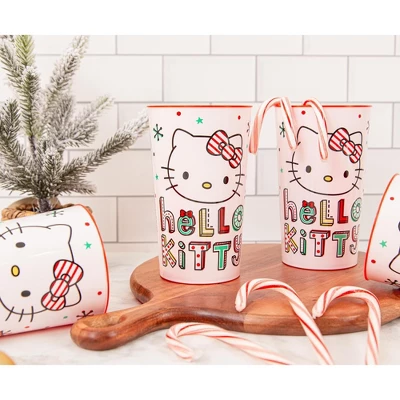 Silver Buffalo Sanrio Hello Kitty Holiday 4-Piece Plastic Cup Set | Each Holds 22 Ounces 1 Silver Buffalo Sanrio Hello Kitty Holiday 4-Piece Plastic Cup Set | Each Holds 22 Ounces