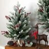Northlight Real Touch™️ Potted Flocked Mini Fir Pine Artificial Christmas Tree - 25" - Unlit