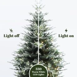LuxenHome 7Ft Pre-Lit Green Artificial Fir Christmas Tree With Mistletoe Decorations And Metal Stand 13 LuxenHome 7Ft Pre-Lit Green Artificial Fir Christmas Tree With Mistletoe Decorations And Metal Stand -Northlight Sale Store GUEST defb2c74 af0b 4c29 9dad ec35a800fd83
